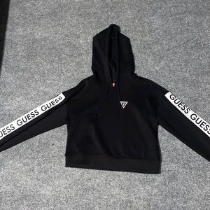 Black with white stripes along arms, Cropped